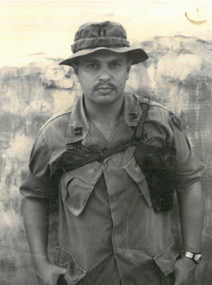 sepia toned image of john stevens berry in military gear during vietnam